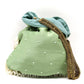 Parrot-green potli with pearls - Rajwada