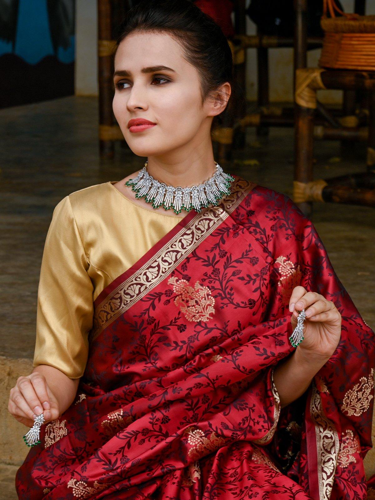 Shinny Crystal And Emerald Embellished Necklace With Earrings - Rajwada