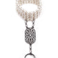 Stunning artificial pearl bracelet with a ring - Rajwada