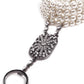 Stunning artificial pearl bracelet with a ring - Rajwada