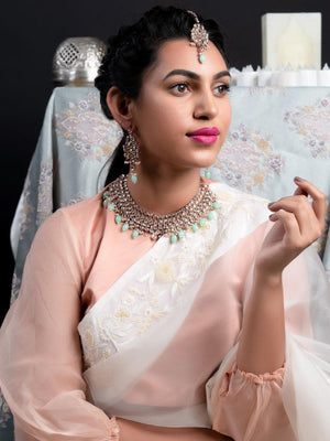 Supple Clear Stone-Green Mani Copper Tone Necklace Set - Rajwada