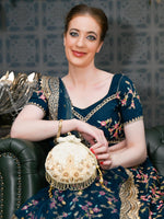 THE VERY STYLISH BEIGE POTLI BAG - Odette