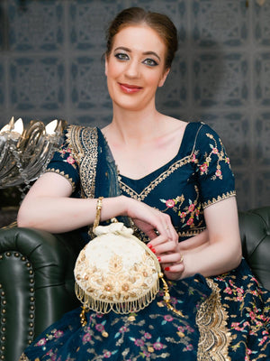 THE VERY STYLISH BEIGE POTLI BAG - Odette