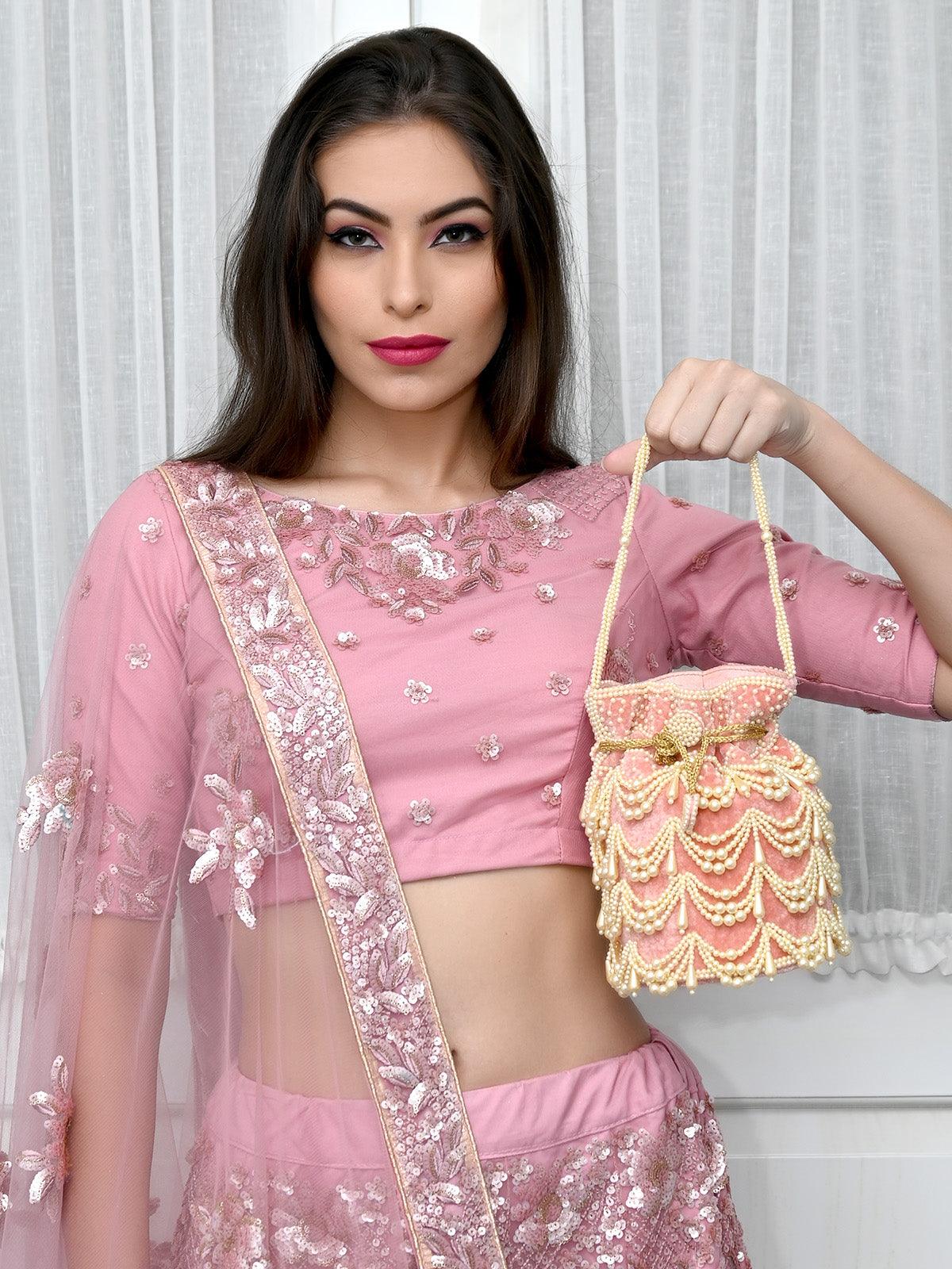 THE VERY STYLISH PEACH POTLI BAG - Odette