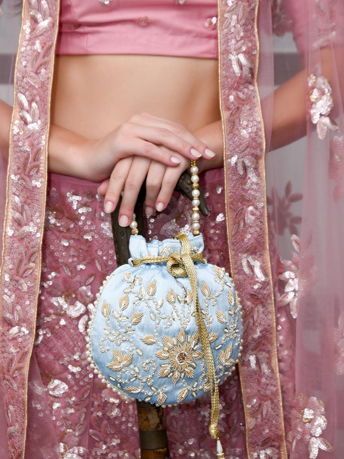 THE VERY STYLISH POWDER BLUE COLORED POTLI BAG - Odette